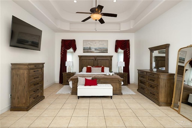 806 Beryl Cir, Weslaco, TX 78596 - bedroom with a tray ceiling, baseboards, light tile patterned flooring, recessed lighting, and a ceiling fan