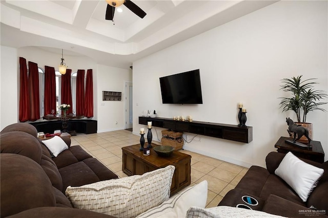 806 Beryl Cir, Weslaco, TX 78596 - living area featuring light tile patterned floors, a ceiling fan, and baseboards