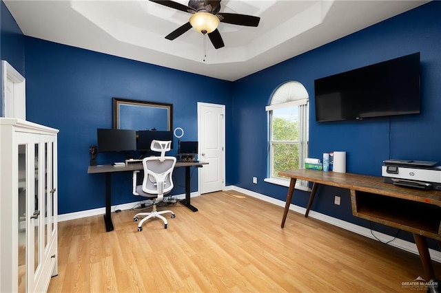 806 Beryl Cir, Weslaco, TX 78596 - office featuring a raised ceiling, wood finished floors, ceiling fan, and baseboards