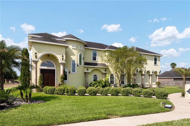 806 Beryl Cir, Weslaco, TX 78596 - mediterranean / spanish home featuring stucco siding