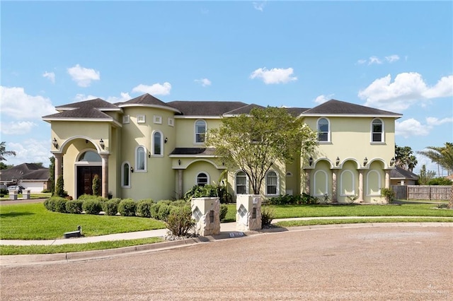 806 Beryl Cir, Weslaco, TX 78596 - mediterranean / spanish home featuring stucco siding