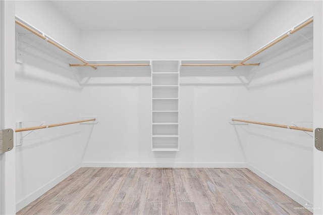 4720 Waterford Ave, Edinburg, TX 78539 - walk in closet with wood finished floors