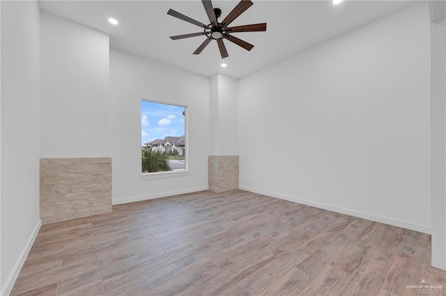 4720 Waterford Ave, Edinburg, TX 78539 - empty room featuring wood finished floors, ceiling fan, recessed lighting, and baseboards