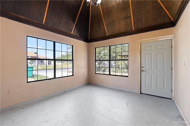 empty room with wood ceiling and lofted ceiling