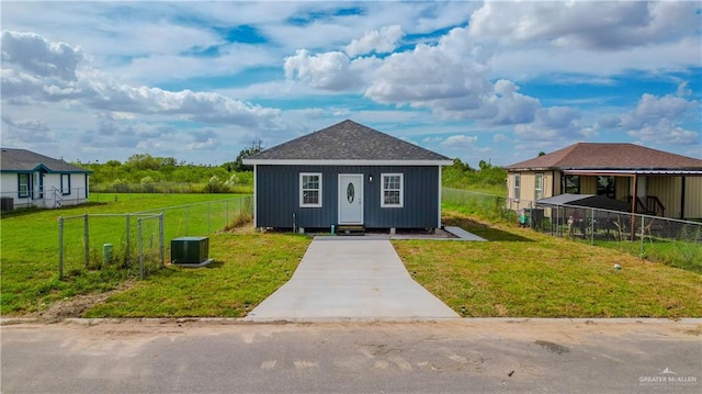 503 Amalia Ave, Edinburg, TX 78542 - view of front facade with an outdoor structure and a front lawn