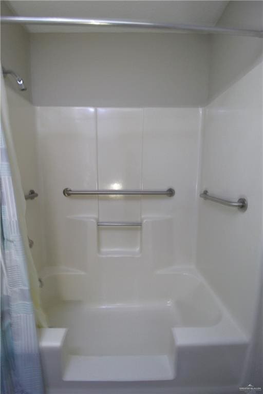 bathroom with curtained shower