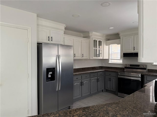 kitchen with white cabinets, gray cabinets, and stainless steel appliances