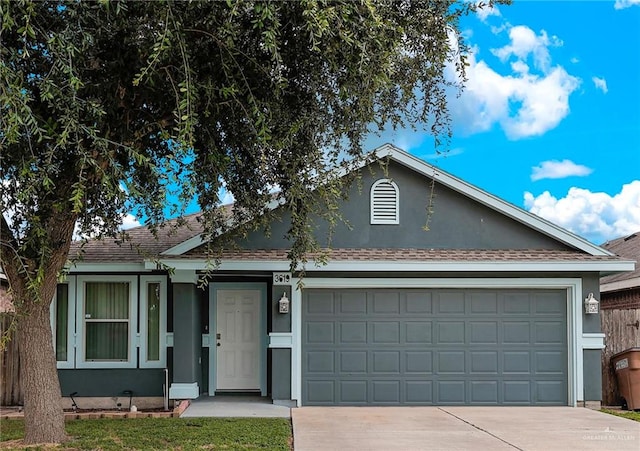 single story home featuring a garage