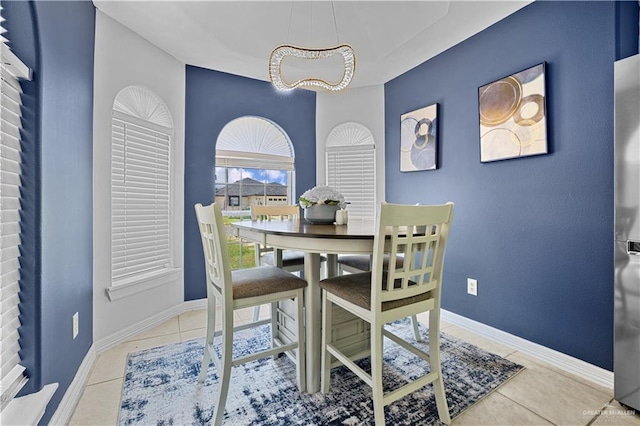 317 Ohara Dr, Pharr, TX 78577 - tiled dining area featuring baseboards