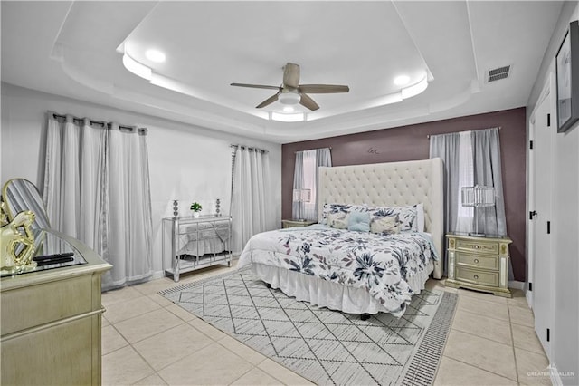 317 Ohara Dr, Pharr, TX 78577 - bedroom with a raised ceiling, light tile patterned floors, recessed lighting, a ceiling fan, and baseboards