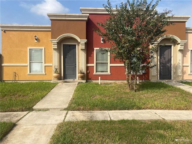 view of front of house with a front lawn