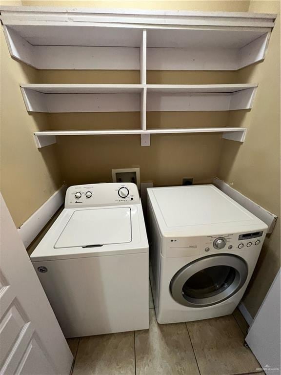 laundry room featuring washer and clothes dryer