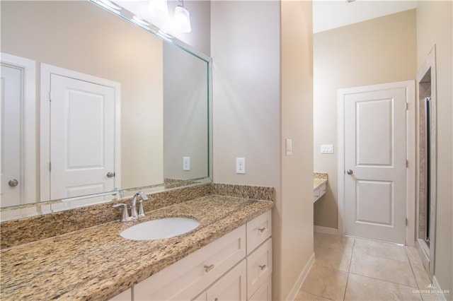 bathroom featuring vanity and tile patterned floors