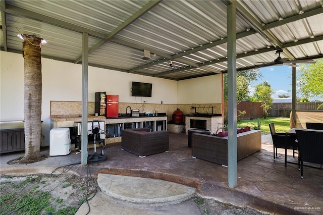 view of patio / terrace featuring an outdoor living space and ceiling fan