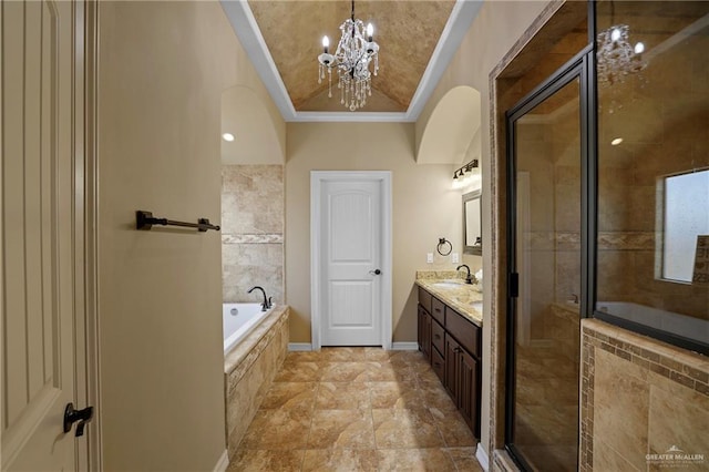 bathroom with a stall shower, baseboards, a sink, crown molding, and a bath