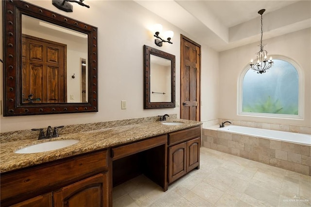 bathroom featuring vanity and tiled tub