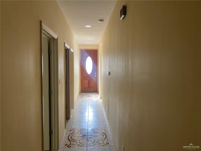 hallway with light tile patterned floors