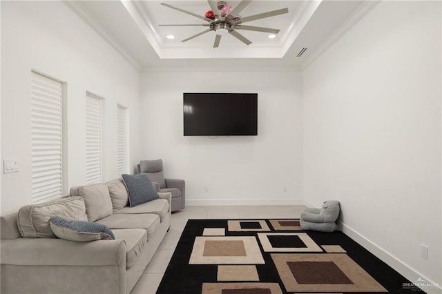 living room featuring ceiling fan, crown molding, recessed lighting, light tile patterned flooring, and a raised ceiling