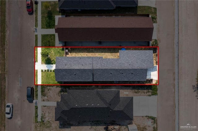 aerial view of property and surrounding area with property boundaries highlighted
