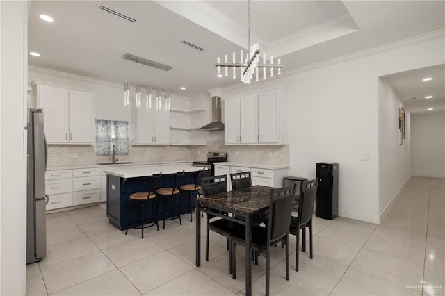 dining space with ornamental molding, a chandelier, light tile patterned floors, and recessed lighting