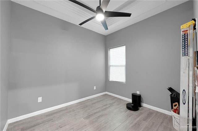 spare room featuring ceiling fan and light hardwood / wood-style floors