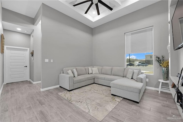 living room featuring ceiling fan