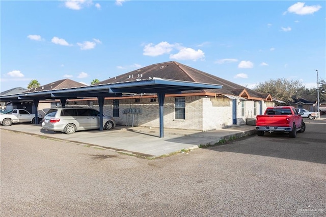 exterior space featuring a carport