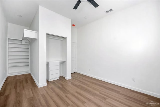 3609 E Santorini Dr, Edinburg, TX 78542 - unfurnished bedroom with baseboards, visible vents, a ceiling fan, and wood finished floors