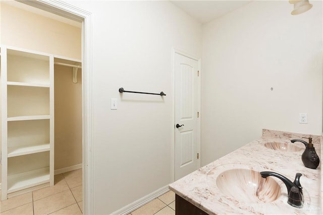 bathroom with vanity and tile patterned floors