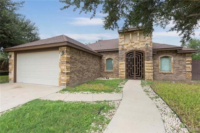 view of front of home with a garage