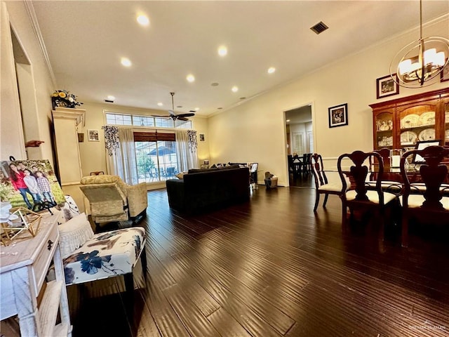 living room featuring a ceiling fan, crown molding, and wood finished floors