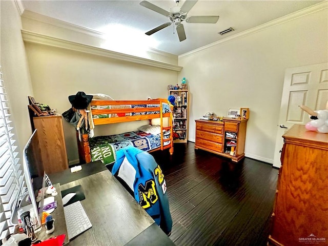 bedroom featuring a ceiling fan, baseboards, visible vents, crown molding, and wood finished floors