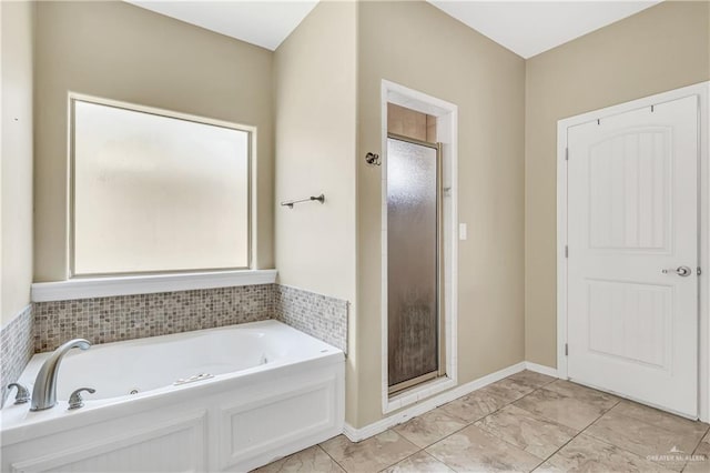 2504 Wernecke Ave, Mission, TX 78574 - bathroom featuring a shower stall, a whirlpool tub, and marble finish flooring