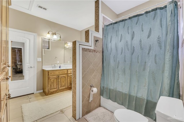 2504 Wernecke Ave, Mission, TX 78574 - full bath featuring toilet, vanity, tile patterned flooring, and shower / bath combo