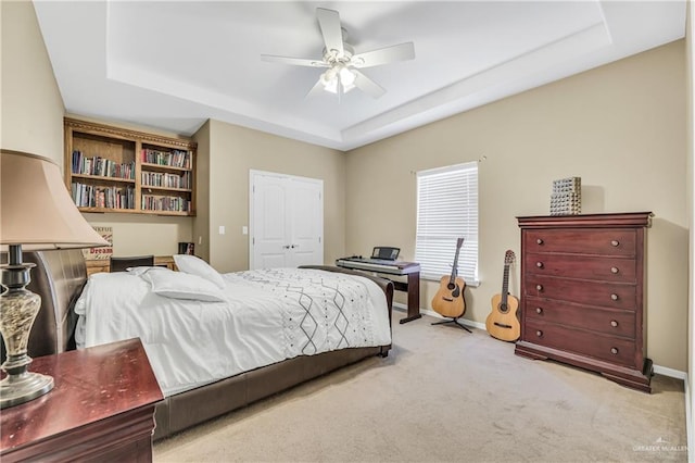 2504 Wernecke Ave, Mission, TX 78574 - bedroom with a tray ceiling, carpet flooring, baseboards, and a closet