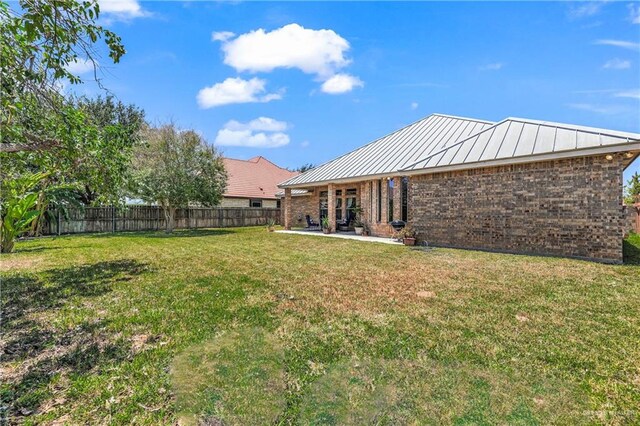 2504 Wernecke Ave, Mission, TX 78574 - view of yard featuring a patio