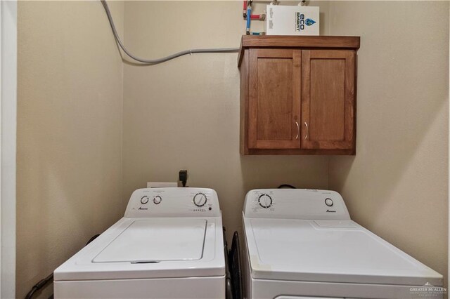 2715 Mimosa St Unit 9, Mission, TX 78572 - laundry area with cabinet space and separate washer and dryer