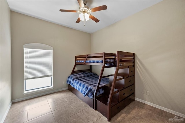 2715 Mimosa St Unit 9, Mission, TX 78572 - tiled bedroom with baseboards