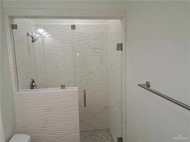 708 E 3rd Ave, Elsa, TX 78543 - bathroom with a stall shower and toilet