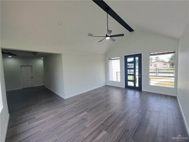 708 E 3rd Ave, Elsa, TX 78543 - unfurnished room with beamed ceiling, dark wood-style floors, baseboards, ceiling fan, and high vaulted ceiling