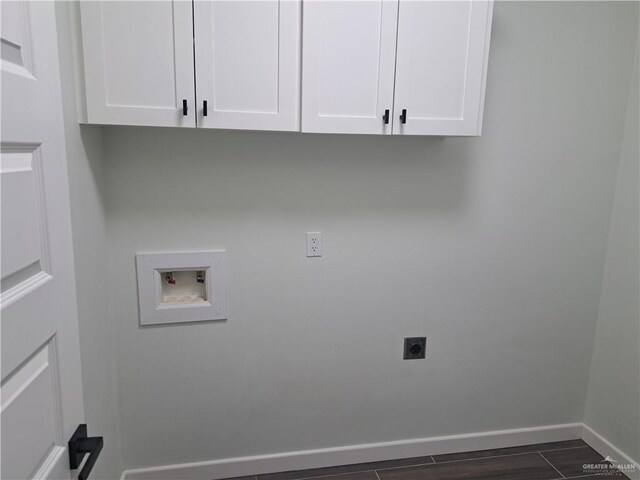 708 E 3rd Ave, Elsa, TX 78543 - laundry room featuring hookup for a washing machine, hookup for an electric dryer, cabinet space, and baseboards