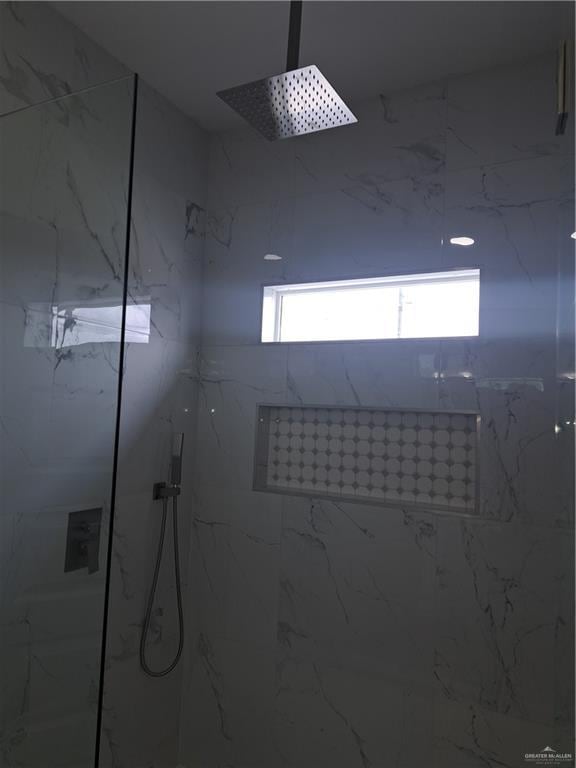 708 E 3rd Ave, Elsa, TX 78543 - bathroom view of a marble finish shower