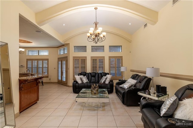 living room with a notable chandelier, vaulted ceiling with beams, light tile patterned flooring, and sink