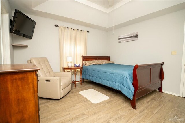 bedroom featuring light hardwood / wood-style floors