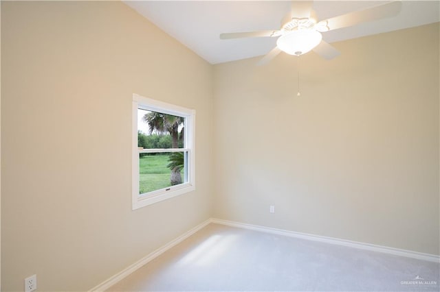 carpeted empty room with ceiling fan