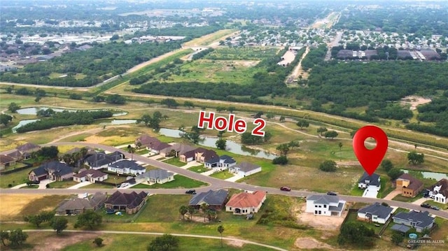 1209 Rhett Dr, Pharr, TX 78577 - aerial perspective of suburban area featuring a nearby body of water