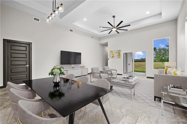 1209 Rhett Dr, Pharr, TX 78577 - living room featuring a raised ceiling, light marble finish flooring, recessed lighting, and a ceiling fan