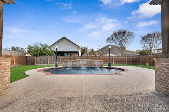 view of swimming pool with a patio area, a fenced backyard, and a fenced in pool