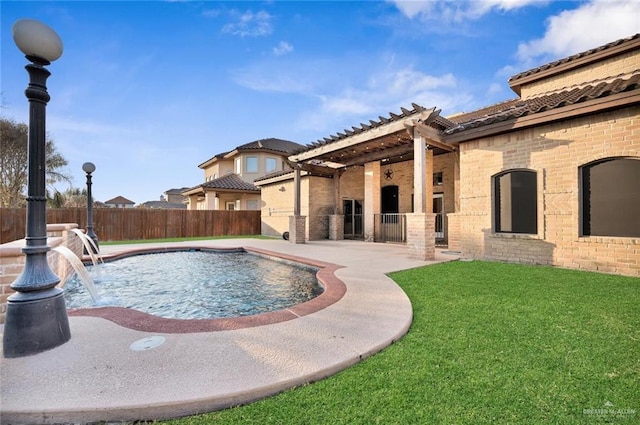 view of swimming pool with a fenced in pool, a patio, a lawn, fence, and a pergola