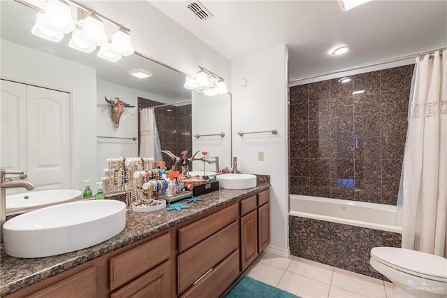 310 E Houston St Unit 1403, Port Isabel, TX 78578 - full bath with tiled shower / bath, tile patterned floors, and double vanity